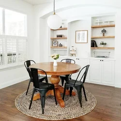Photos of small kitchens with a round table