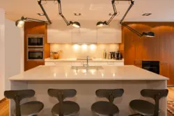 Kitchen design with track lamps photo