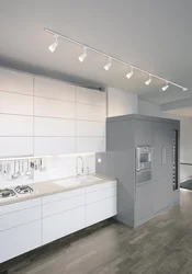 Kitchen design with track lamps photo