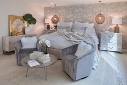 Bedroom design with bed and armchair