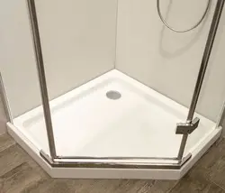 Shower tray in the bathroom interior