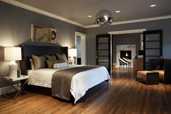 Dark bed in the bedroom interior photo design