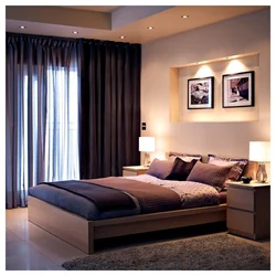 Dark bed in the bedroom interior photo design