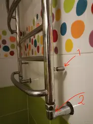 How to hang a heated towel rail in the bathroom photo