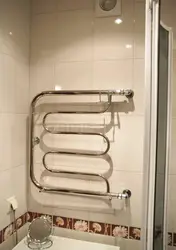 How to hang a heated towel rail in the bathroom photo