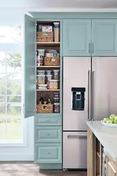 Узкий холодильник на маленькой кухне фото