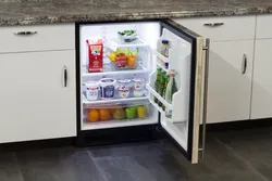 Narrow Refrigerator In A Small Kitchen Photo