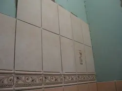 Tiles on drywall in the bathroom photo