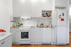 Kitchen design with white refrigerator and stove