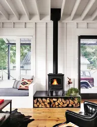 Stove fireplace in the kitchen interior