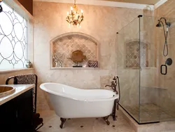 Bathtub in the center of the bathroom photo