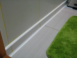 Baseboards in the bathroom on the floor photo