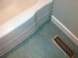 Baseboards in the bathroom on the floor photo