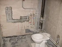 Plumbing in the bathroom and toilet photo