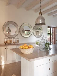 Round decorative mirrors in the kitchen interior