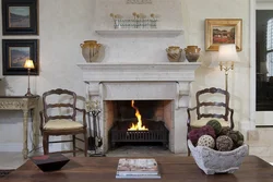Fireplace in Provence style in the living room interior