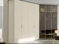 Wardrobe with hinged doors in the living room photo