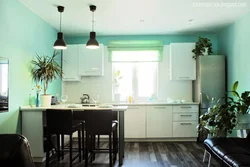 What color goes with mint in the kitchen interior photo