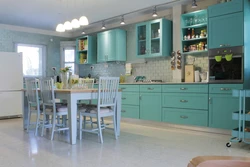 What color goes with mint in the kitchen interior photo