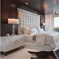 Bedroom With High Bed Photo