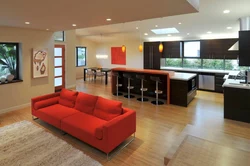 Kitchen design with red sofa