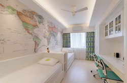 World map in bedroom interior photo