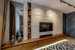 Chest of drawers on the entire wall in the living room photo