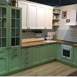 Green IKEA kitchen in the interior photo