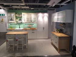 Green IKEA kitchen in the interior photo