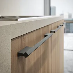 Handles for kitchen facades in the interior