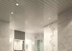 Ceiling made of aluminum panels in the bathroom photo