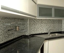 White mosaic tiles in the kitchen apron photo