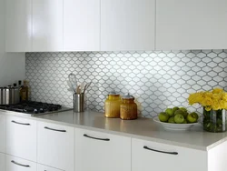 White mosaic tiles in the kitchen apron photo