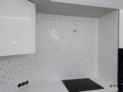 White mosaic tiles in the kitchen apron photo