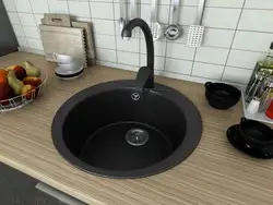 Round sink in the kitchen interior