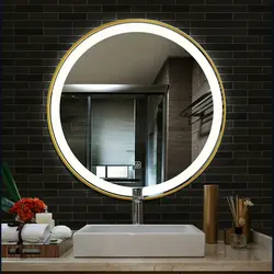 Round mirror in the bathroom photo