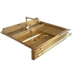 Gold sink in the kitchen photo