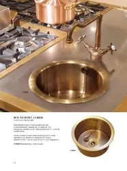 Gold sink in the kitchen photo