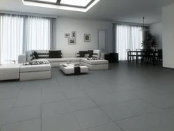 Gray porcelain tiles on the floor in the interior of the apartment