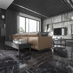 Gray porcelain tiles on the floor in the interior of the apartment