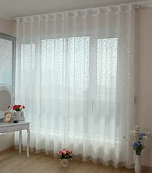 Curtains without tulle in the bedroom interior