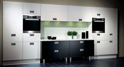 Photo Of A Kitchen With Black Handles