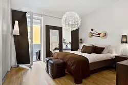 Combination of gray and brown in the bedroom interior photo in the interior