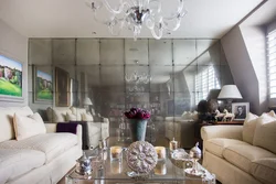 Living room interior with mirrors on the wall photo