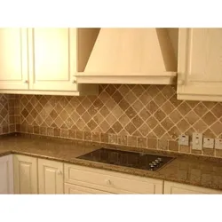 Travertine in the kitchen interior photo