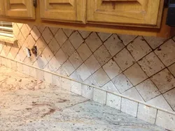 Travertine in the kitchen interior photo