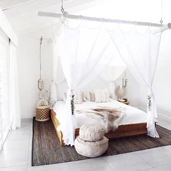 Photo of a bedroom with a canopy