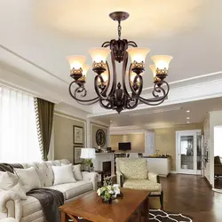 Chandeliers in a classic living room interior photo