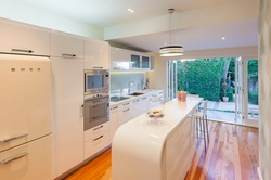 White kitchen beige refrigerator design