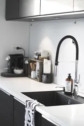 Kitchen design with black faucet